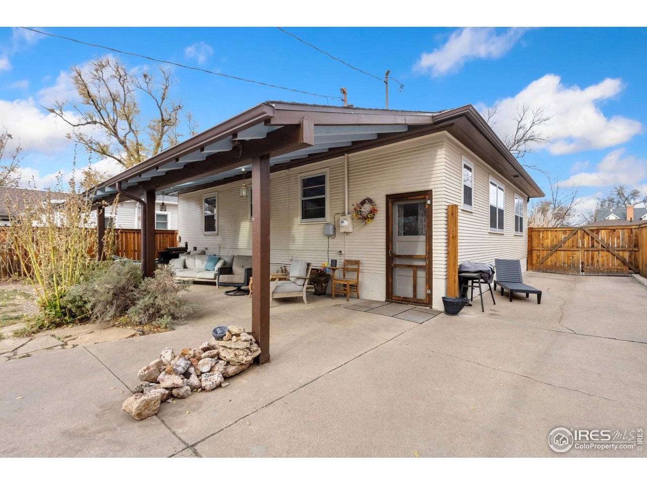 805 Walnut Street Windsor, CO 80550 - Photo 22 of 33 Back patio and RV or Boat Parking