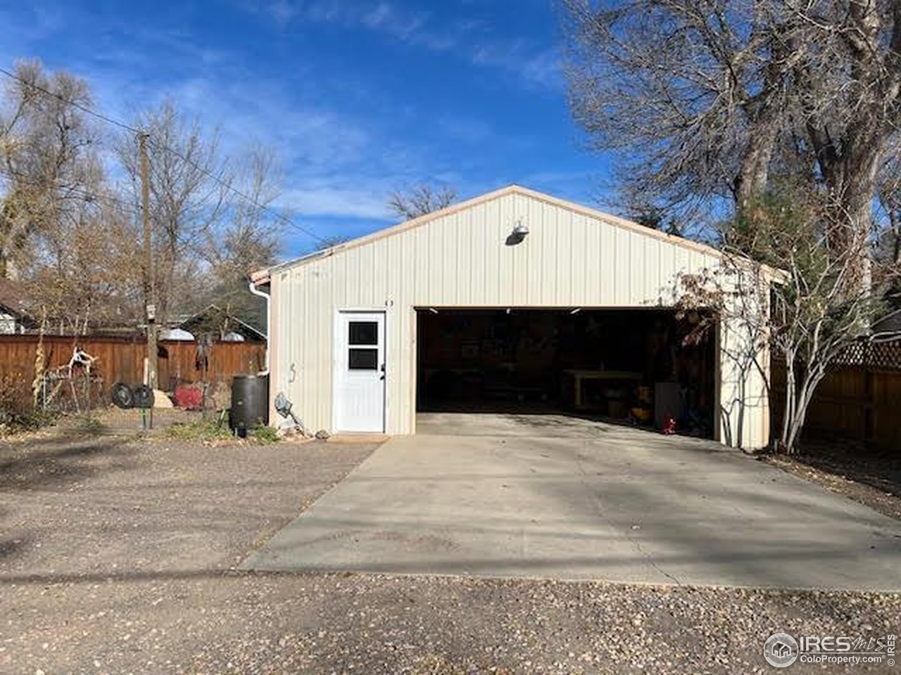 805 Walnut Street Windsor, CO 80550 - Photo 29 of 36 a front view of a house with a yard