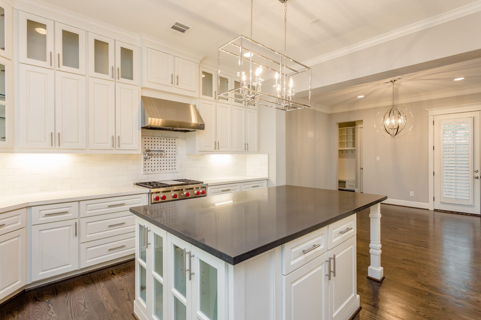 2035 Sheridan Street, Unit A Houston, TX 77030 - Photo 15 of 41 a kitchen that has a sink and a stove in it