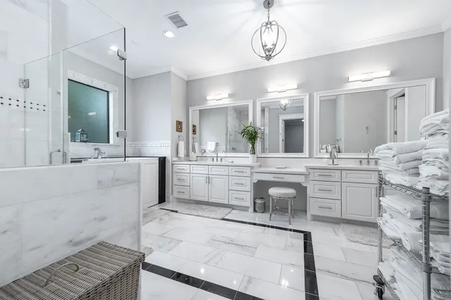 a room with furniture and a potted plant