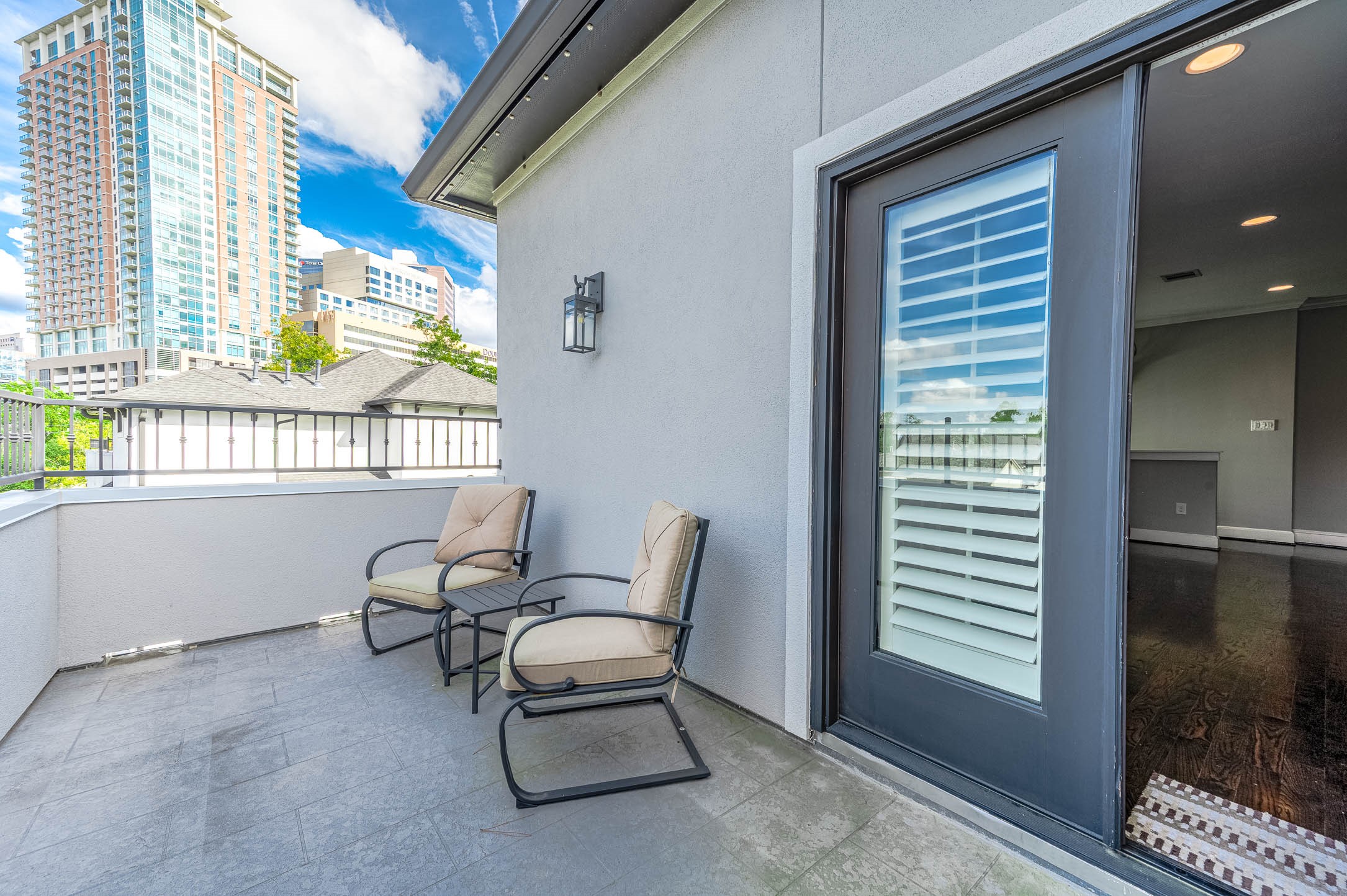 2035 Sheridan Street, Unit A Houston, TX 77030 - Photo 33 of 41 Spacious terrace ideal for outdoor dining, lounging, or entertaining