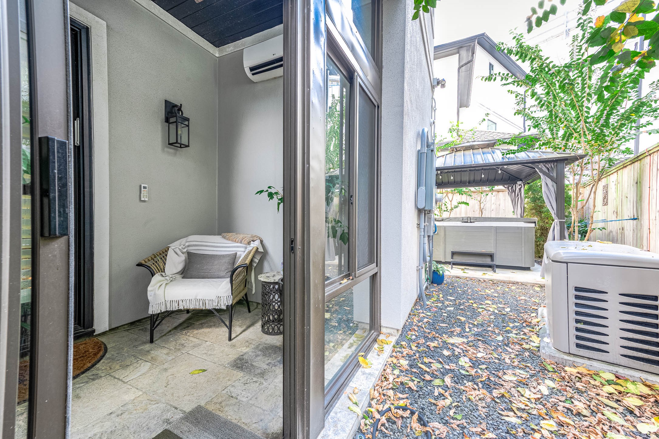 2035 Sheridan Street, Unit A Houston, TX 77030 - Photo 37 of 41 a view of a hallway with chair and front door