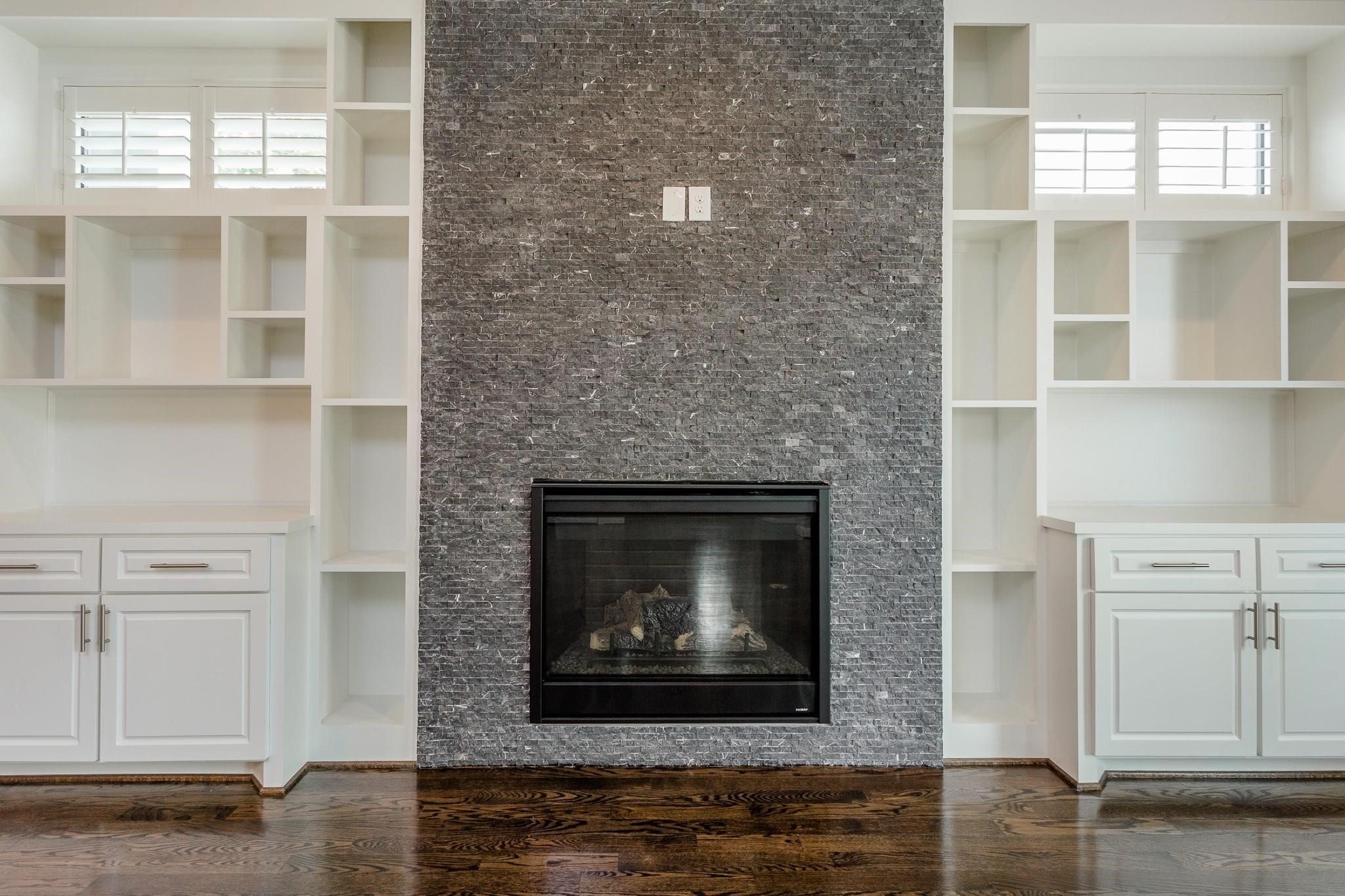 2035 Sheridan Street, Unit A Houston, TX 77030 - Photo 6 of 41 a living room with a fireplace