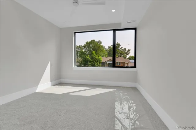 an empty room with a large window