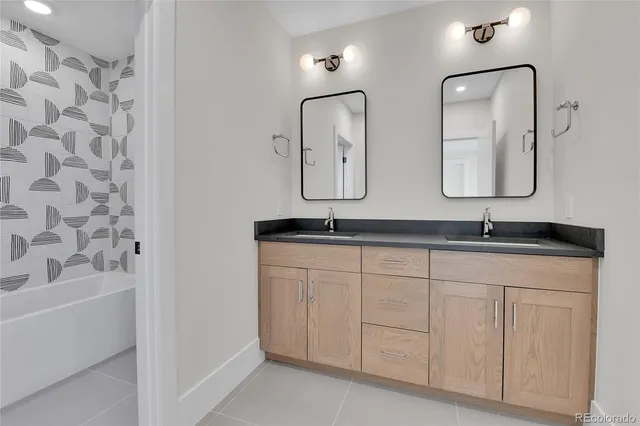 a bathroom with a bathtub and toilet