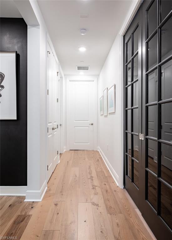 16360 Viansa Way, Unit 8201 Naples, FL 34110 - Photo 19 of 35 a view of wooden floor