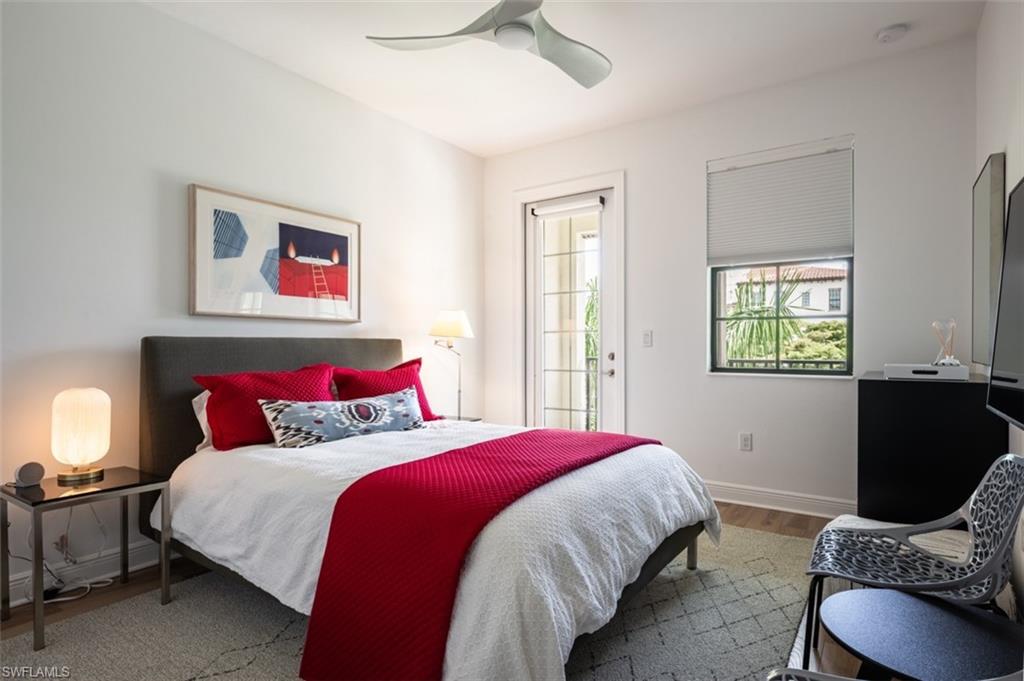 16360 Viansa Way, Unit 8201 Naples, FL 34110 - Photo 23 of 35 a bedroom with bed and a window