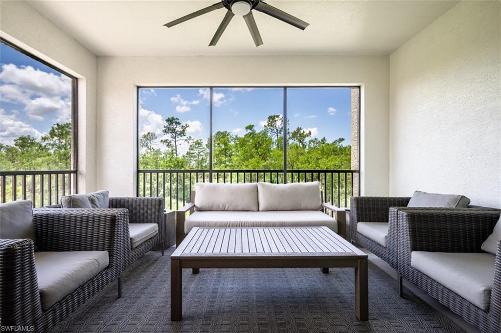 16360 Viansa Way, Unit 8201 Naples, FL 34110 - Photo 28 of 35 a living room with furniture
