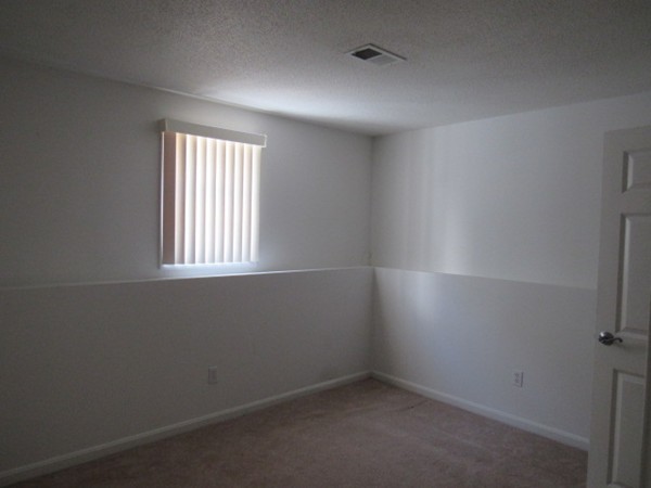 526 Third Street, Unit 4 Fall River, MA 02721 - Photo 8 of 11 an empty room with a window