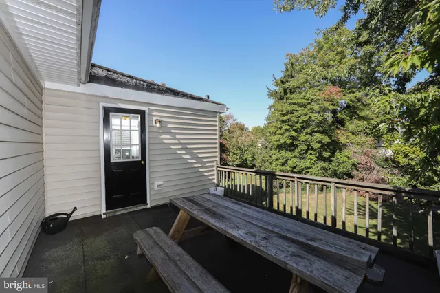 a view of balcony with furniture