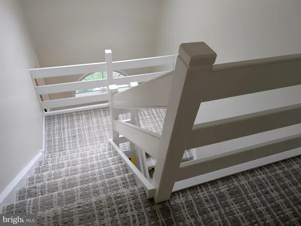 a view of a livingroom with wooden floor