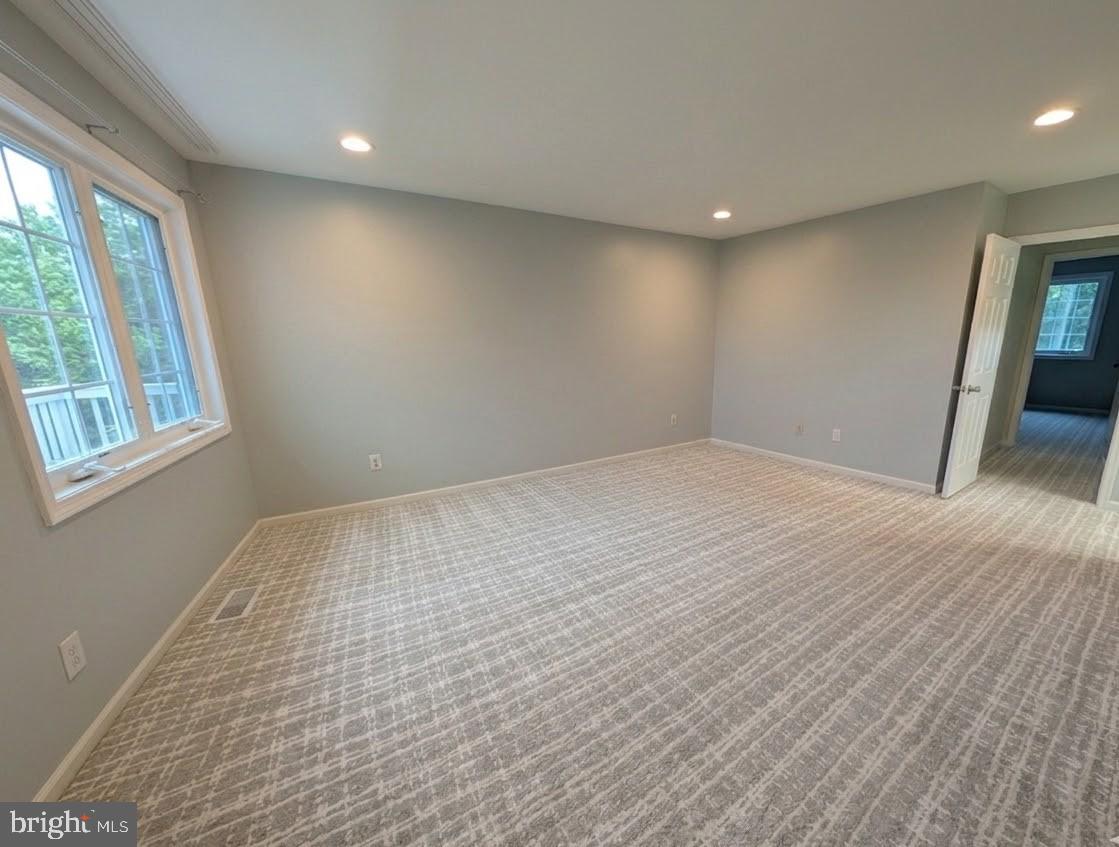 39 Cabot Drive Chesterbrook, PA 19087 - Photo 14 of 25 a view of empty room with wooden floor and fan