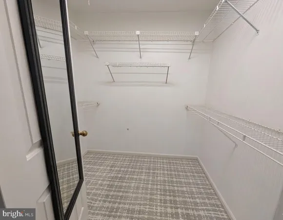 a view of a walk in closet