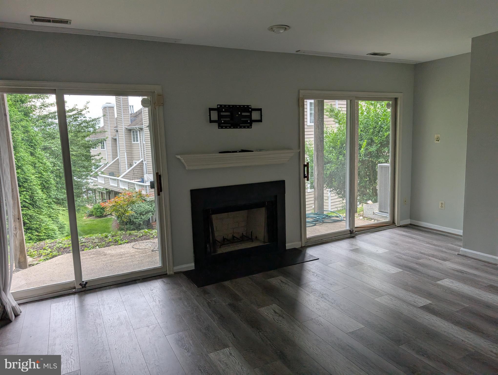 39 Cabot Drive Chesterbrook, PA 19087 - Photo 21 of 25 a view of empty room with wooden floor and fireplace