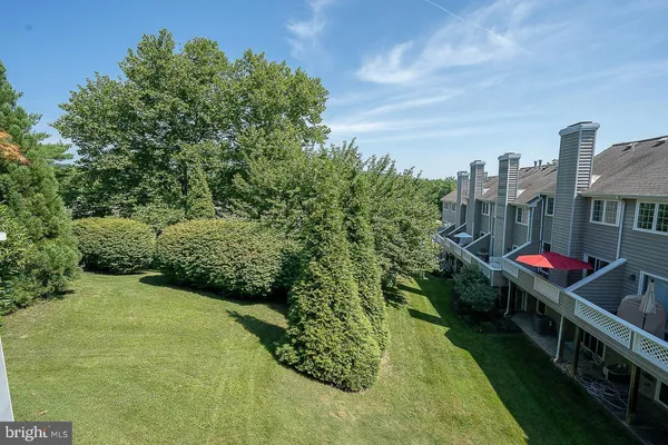 a view of street with tall buildings