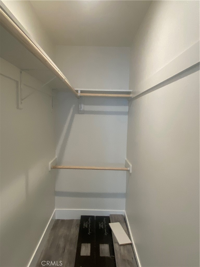 26891 Vista Del Mar, Unit A Dana Point, CA 92624 - Photo 16 of 25 a view of walk in closet with empty racks