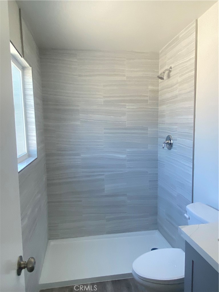 26891 Vista Del Mar, Unit A Dana Point, CA 92624 - Photo 17 of 25 a bathroom with a shower and a toilet