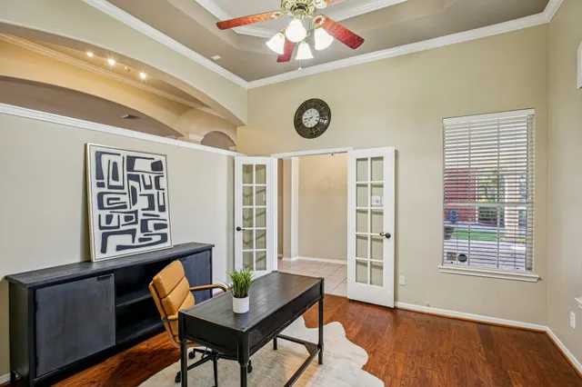 a workspace with furniture and window