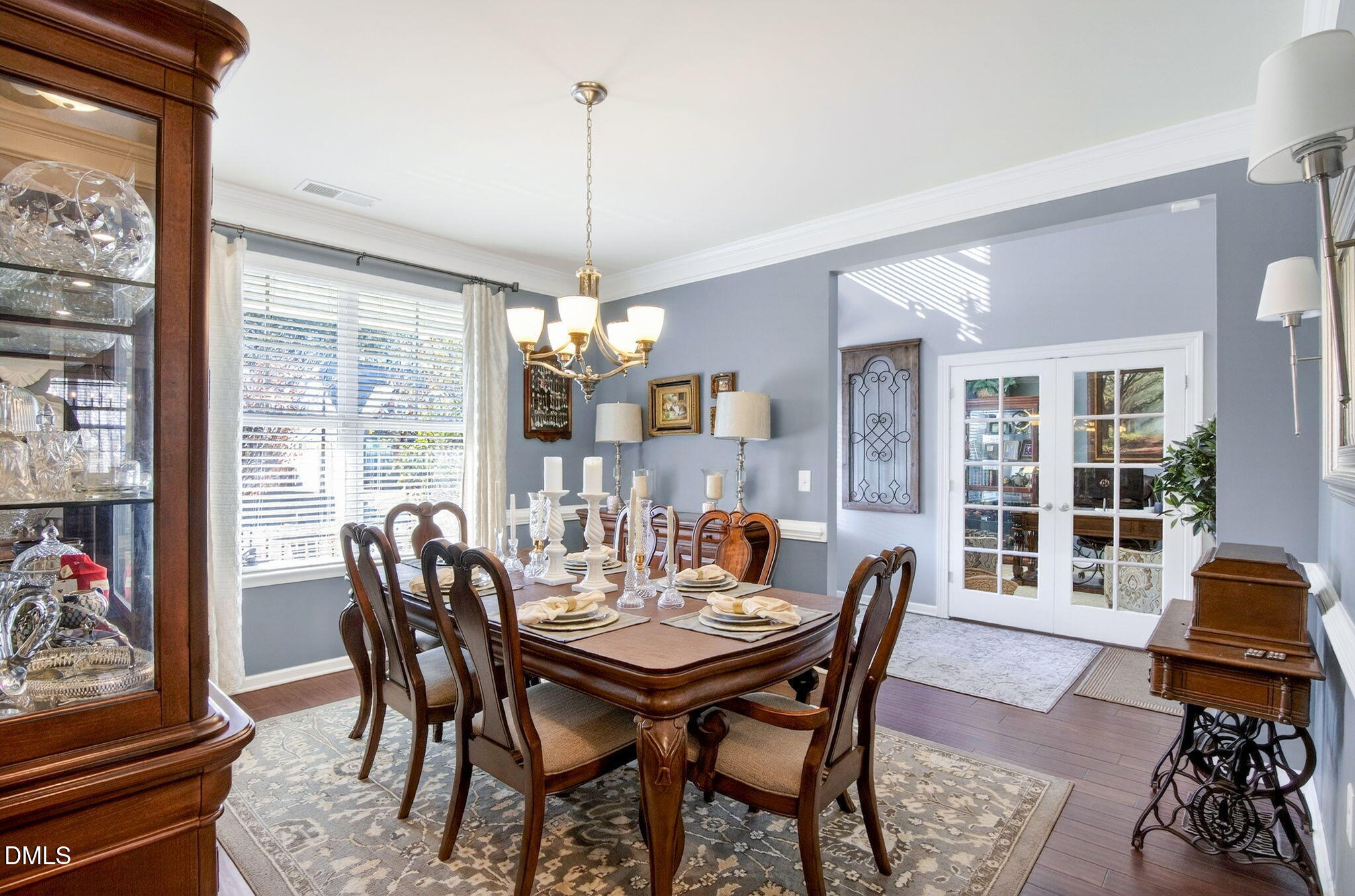 307 Marbella Drive Rolesville, NC 27571 - Photo 12 of 65 a view of a dining room with furniture window and outside view