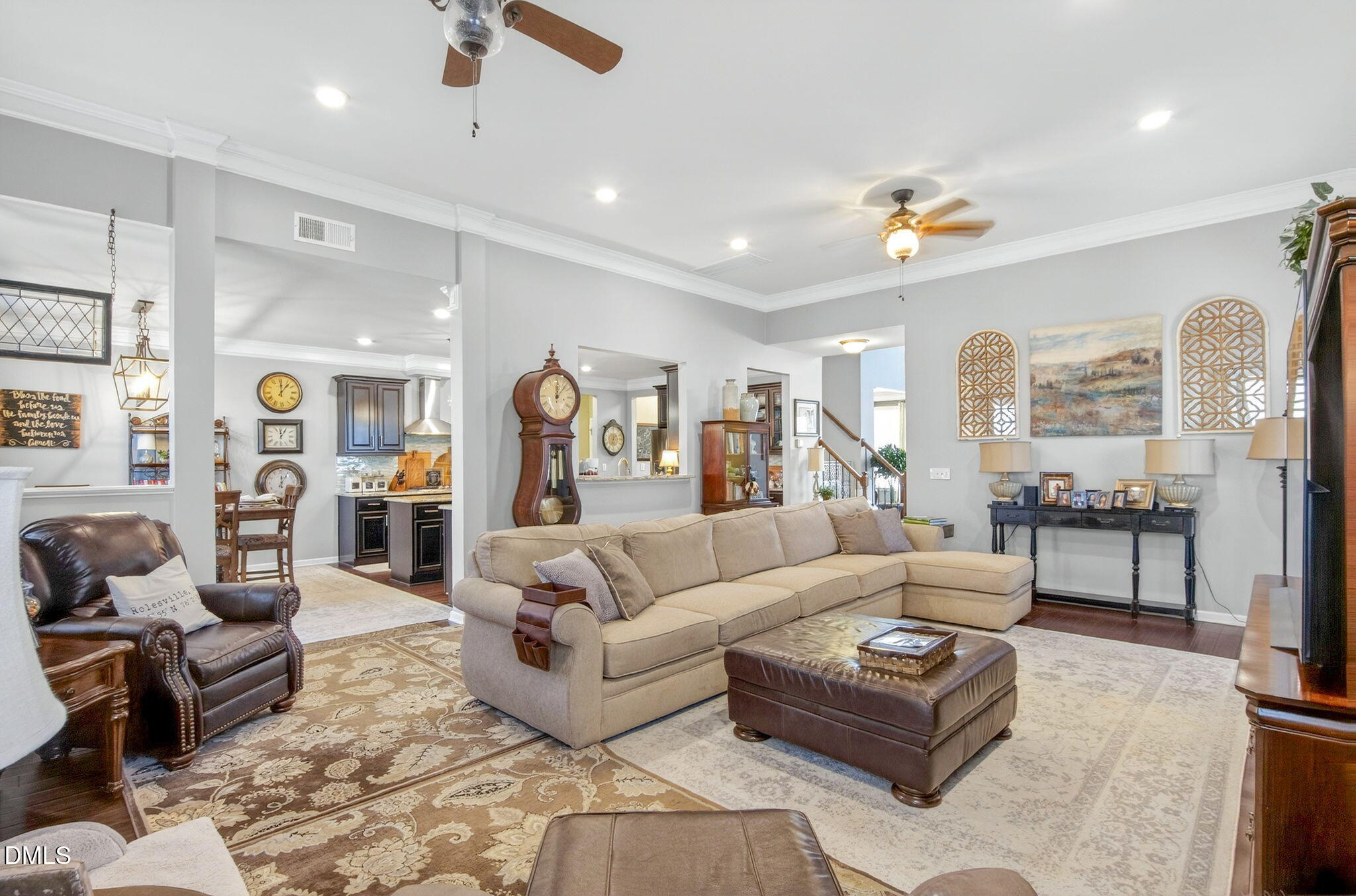 307 Marbella Drive Rolesville, NC 27571 - Photo 20 of 65 a living room with furniture kitchen view and a large window
