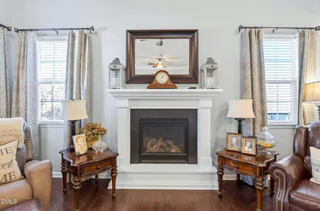 a kitchen with stainless steel appliances granite countertop a stove refrigerator and cabinets