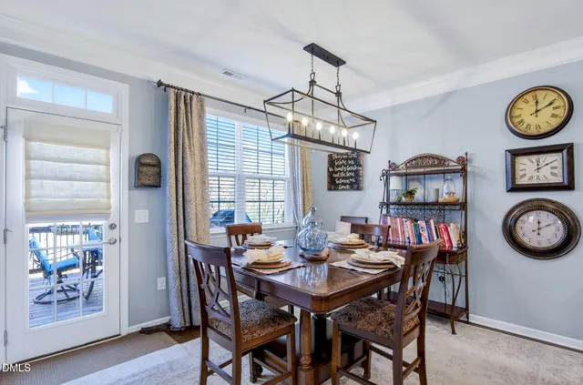 a bathroom with a tub sink shower and mirror