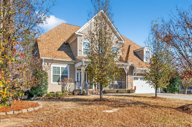 a view of a park with iron fence