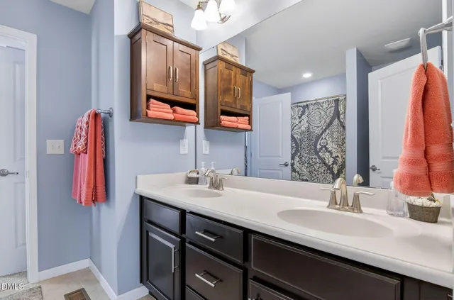 a view of a deck with table and chairs and wooden floor