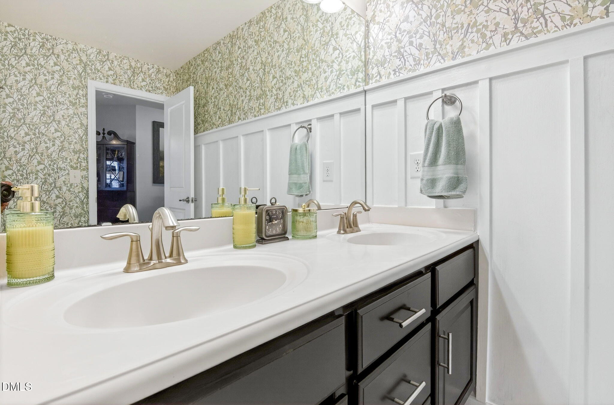 307 Marbella Drive Rolesville, NC 27571 - Photo 53 of 65 a bathroom with a sink and a mirror