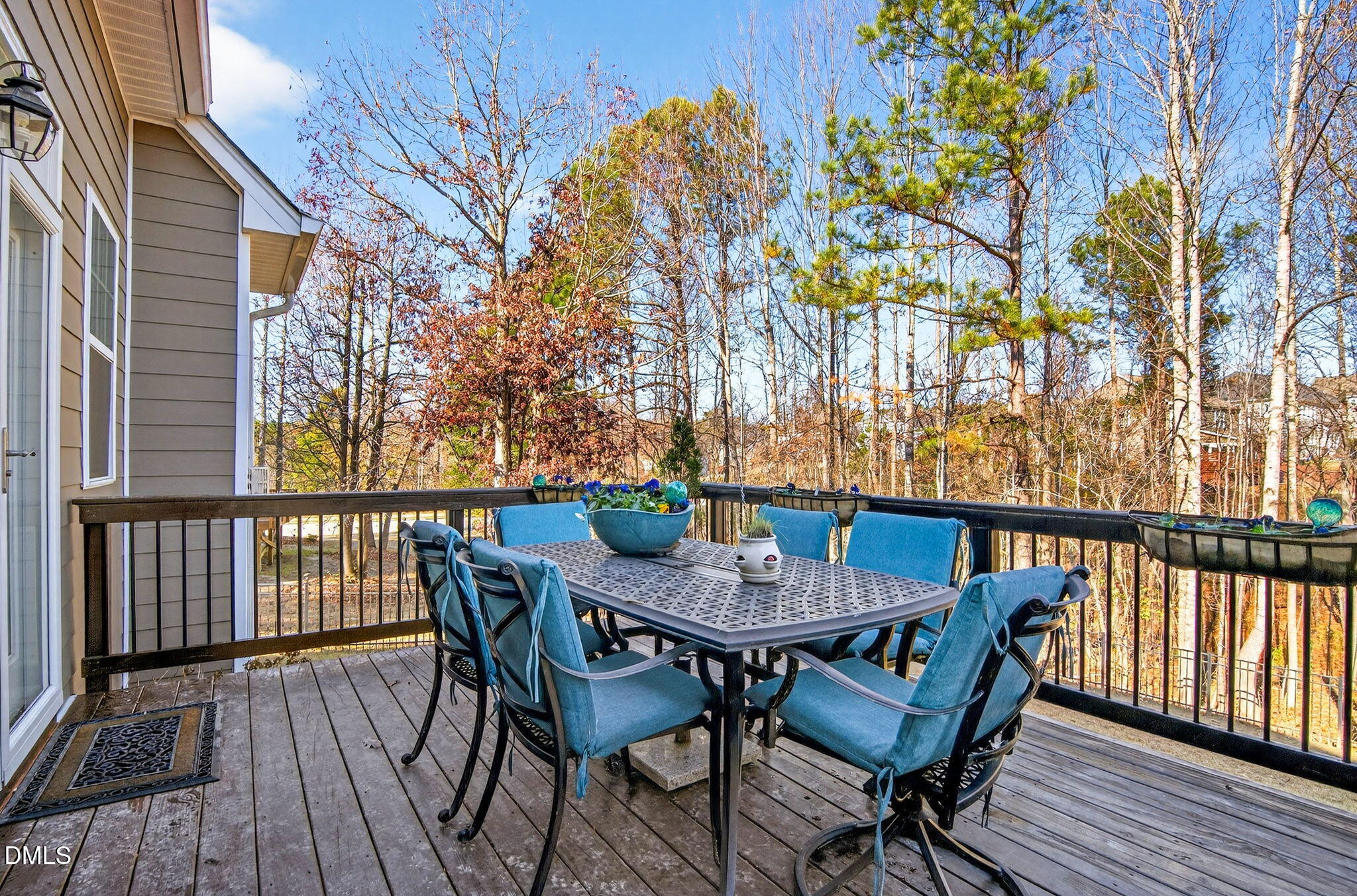 307 Marbella Drive Rolesville, NC 27571 - Photo 59 of 65 a view of a chairs and table on the deck