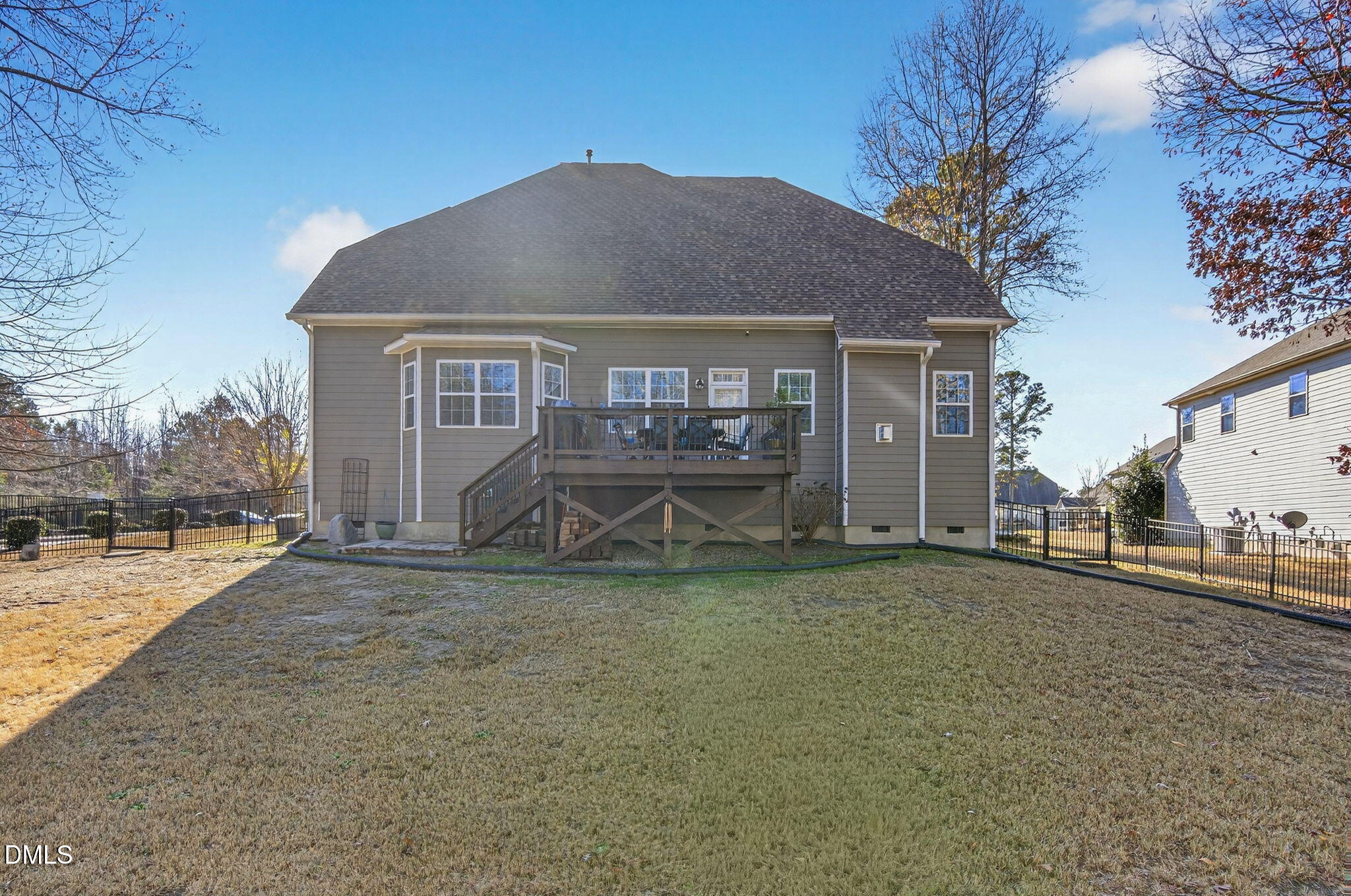307 Marbella Drive Rolesville, NC 27571 - Photo 63 of 65 a view of a house with backyard and a tree