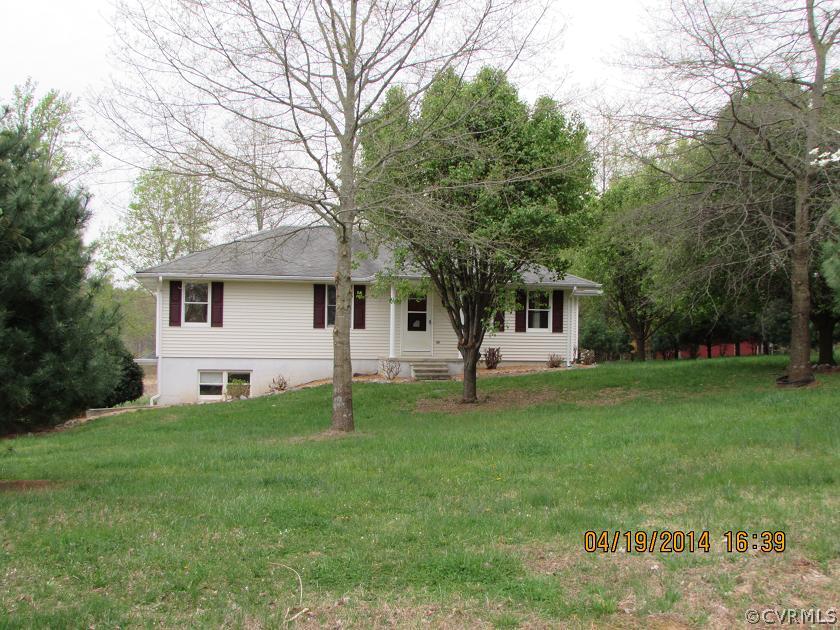 2958 Briery Road Keysville, VA 23947 - Photo 1 of 9 a front view of a house with a garden