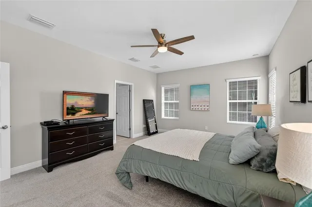 a view of a golf course with a lake