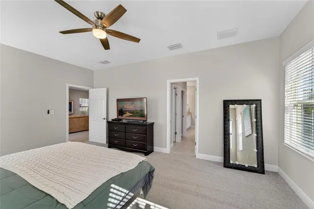 a view of a house with backyard and garden