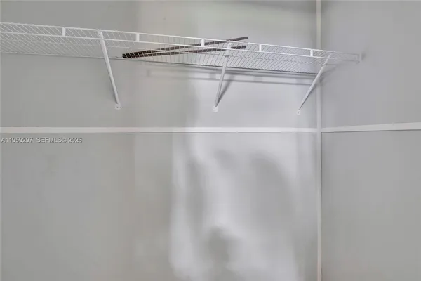 a view of a room with racks on the wall