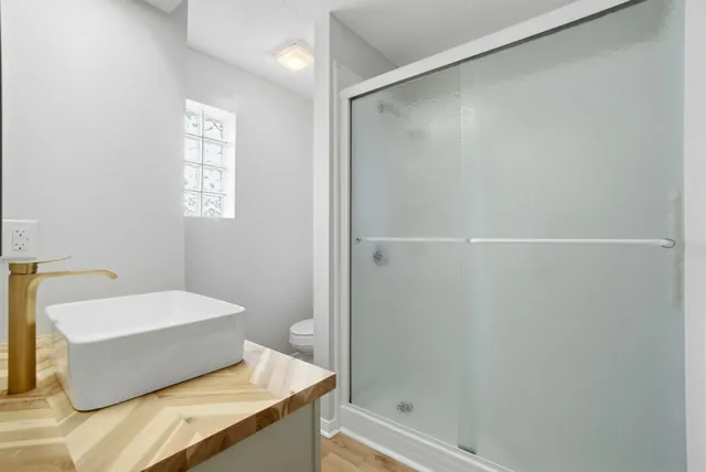 a bathroom with a bathtub and a sink
