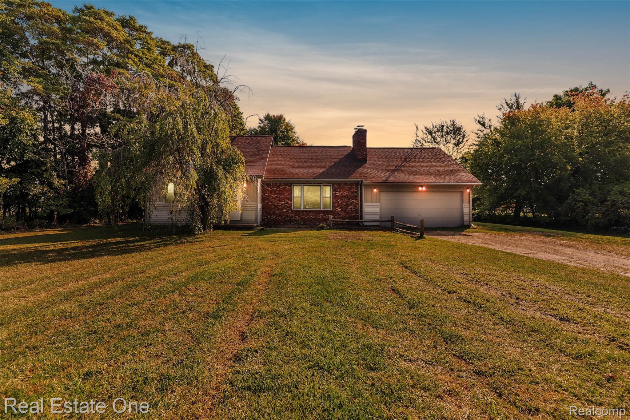 5400 North Fleming Road Fowlerville, MI 48836 - Photo 1 of 40 01-5400 Fleming Rd-WindowStill-Real.jpg