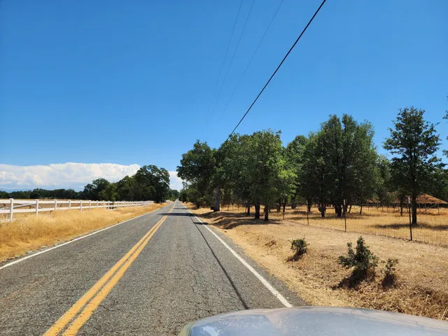 a view of swimming pool with outdoor seating