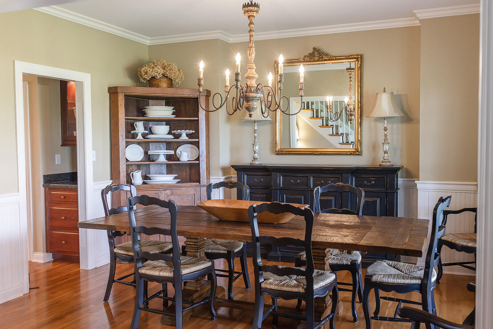6395 Delaney Ferry Road Versailles, KY 40383 - Photo 9 of 52 Enjoy elegant dining in a beautiful dining room, featuring a cozy adjacent butler's area perfect for serving, storage, or entertaining with ease.