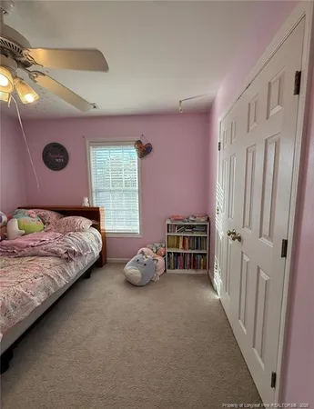 a view of a bathroom with a sink and mirror