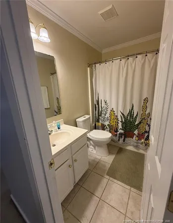 a room with lots of furniture and windows