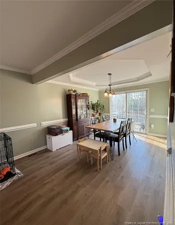 a view of a house with floor to ceiling windows and a fireplace