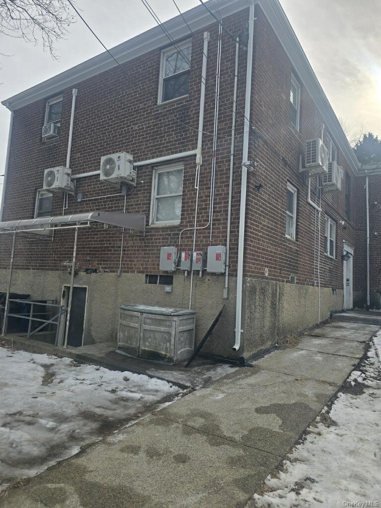 a front view of a house with parking