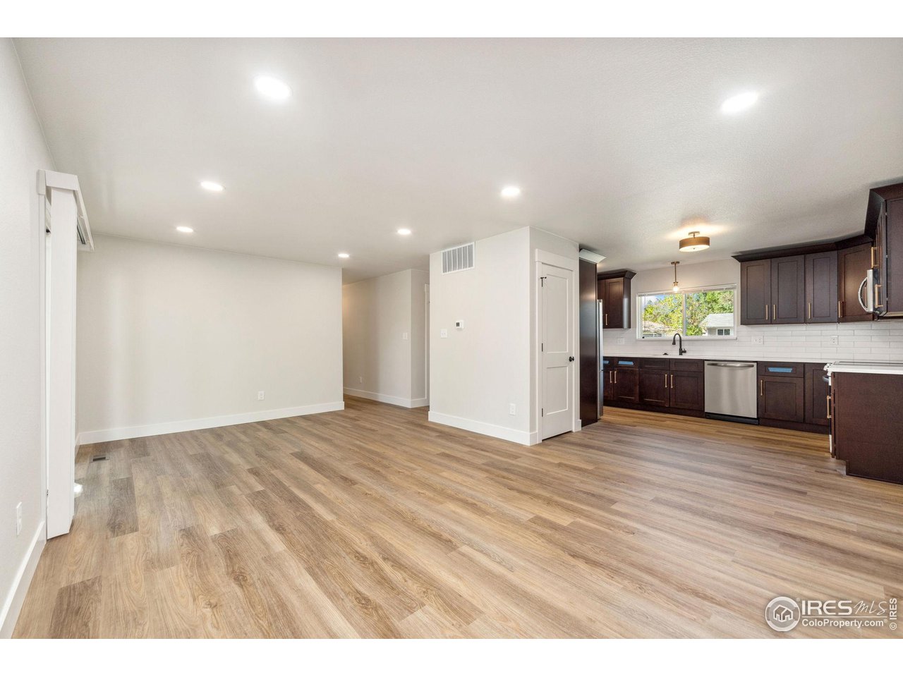 804 Gallup Road Fort Collins, CO 80521 - Photo 7 of 20 Living Room/Kitchen