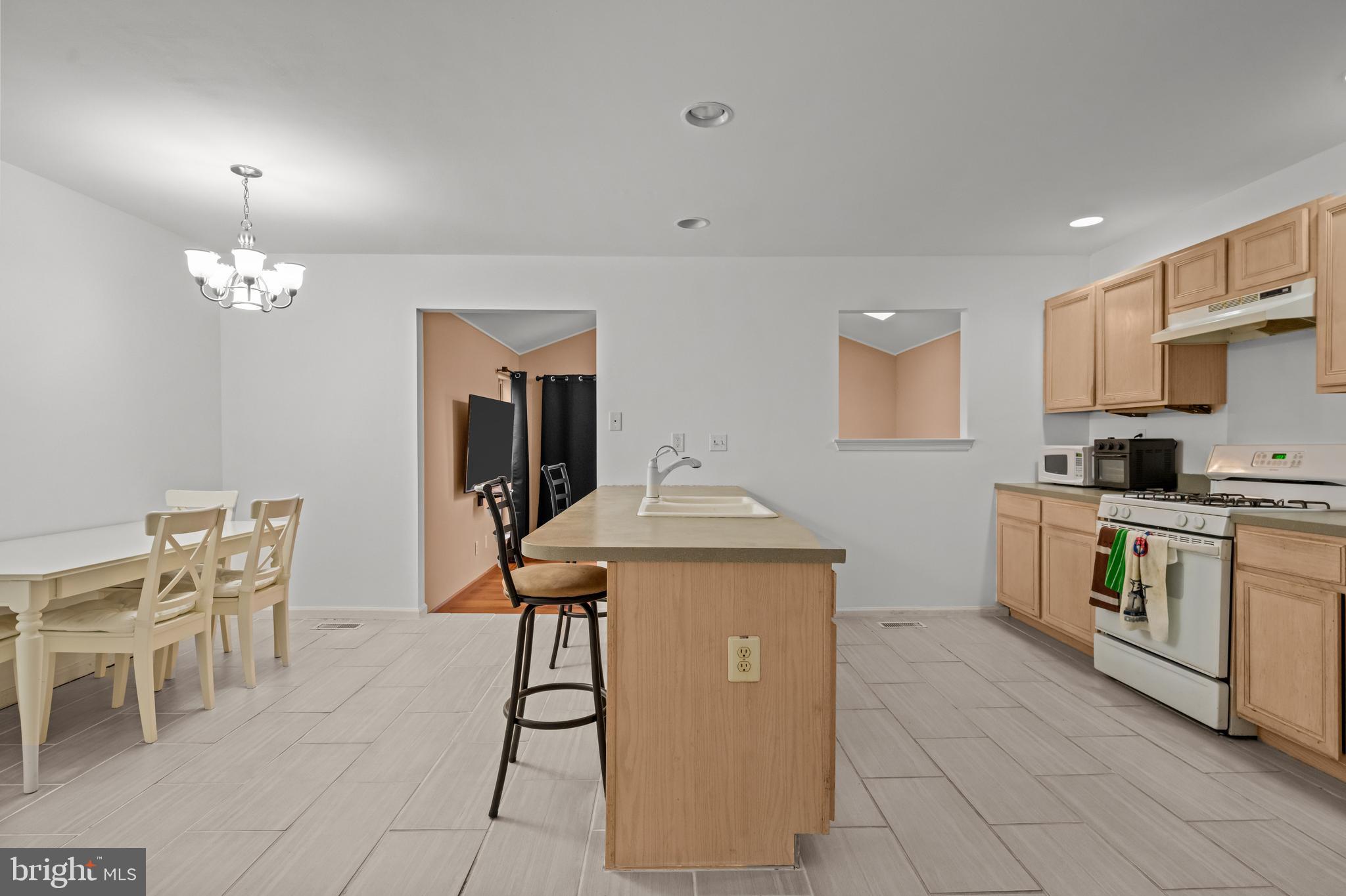 141 Marie Circle Aston, PA 19014 - Photo 8 of 34 Kitchen Island Facing Back