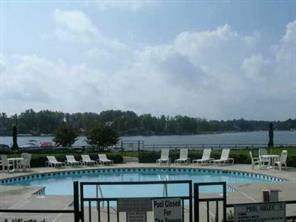 1301 Torrence Circle Davidson, NC 28036 - Photo 2 of 5 a view of a lake with a city view