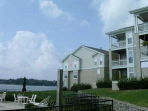 1301 Torrence Circle Davidson, NC 28036 - Photo 4 of 5 a front view of a house with garden