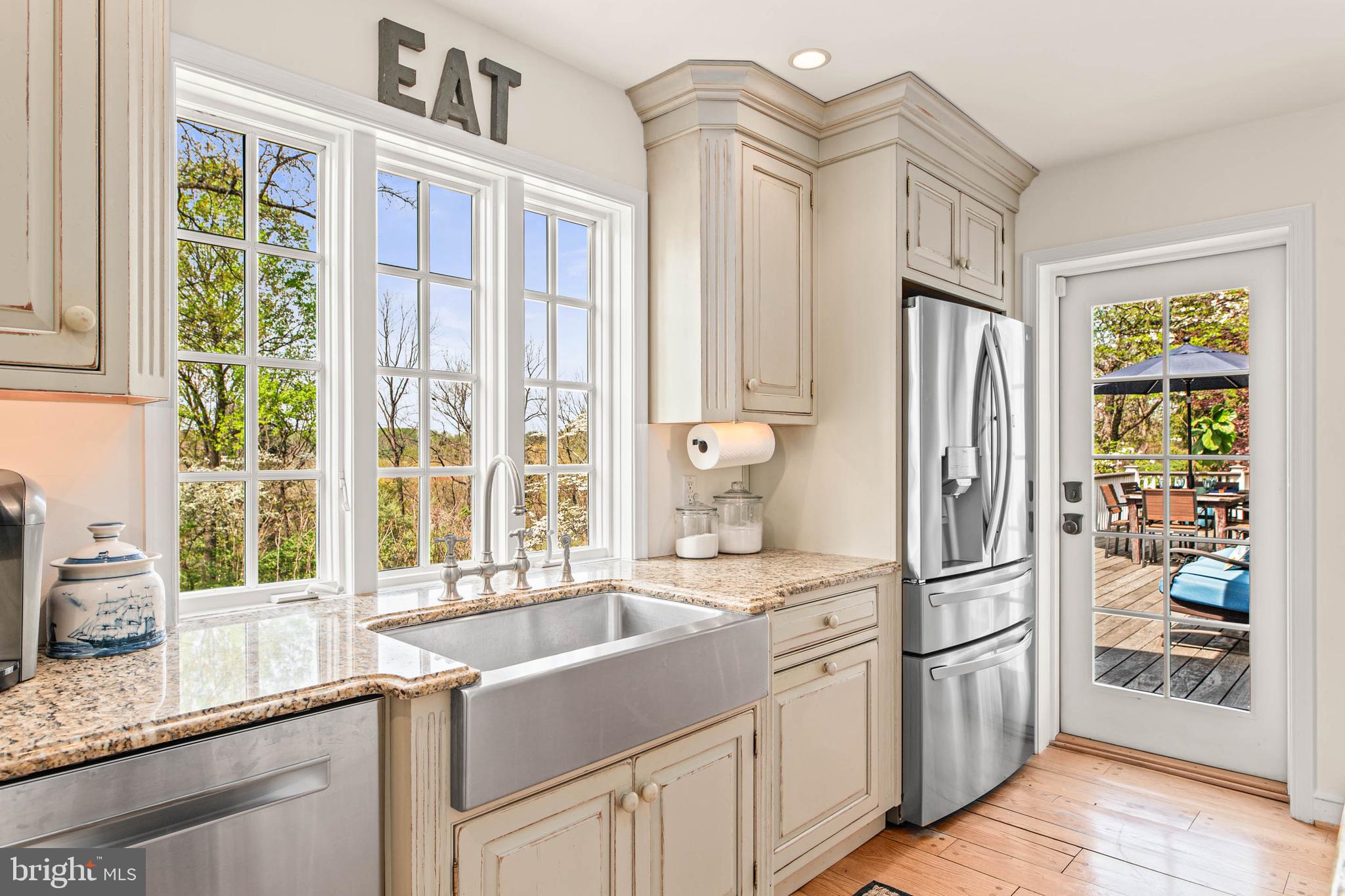 8 Rabbit Run Road Malvern, PA 19355 - Photo 12 of 49 a kitchen with stainless steel appliances granite countertop a refrigerator and a sink