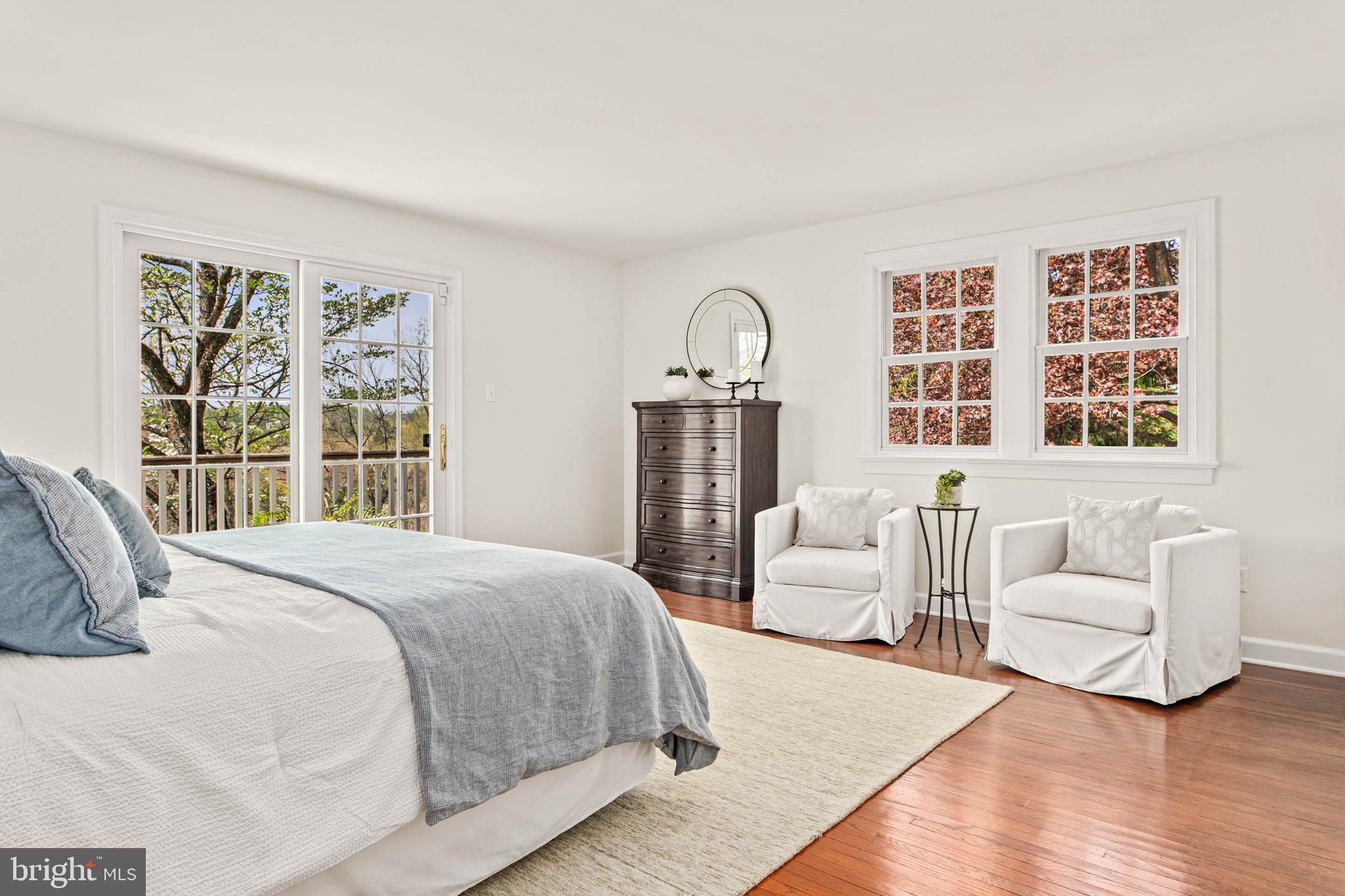 8 Rabbit Run Road Malvern, PA 19355 - Photo 21 of 49 a bedroom with a large bed and a large window