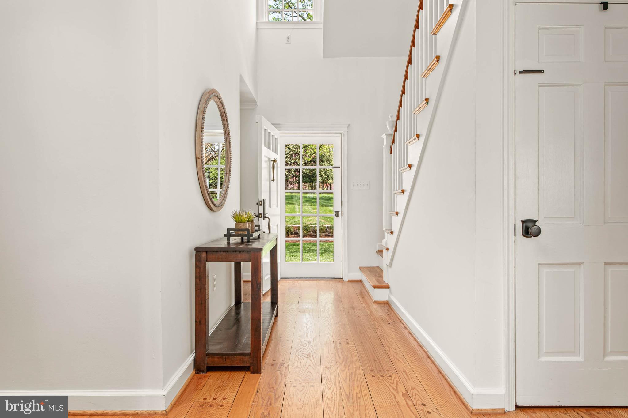 8 Rabbit Run Road Malvern, PA 19355 - Photo 26 of 49 a view of a hallway with wooden floor and staircase